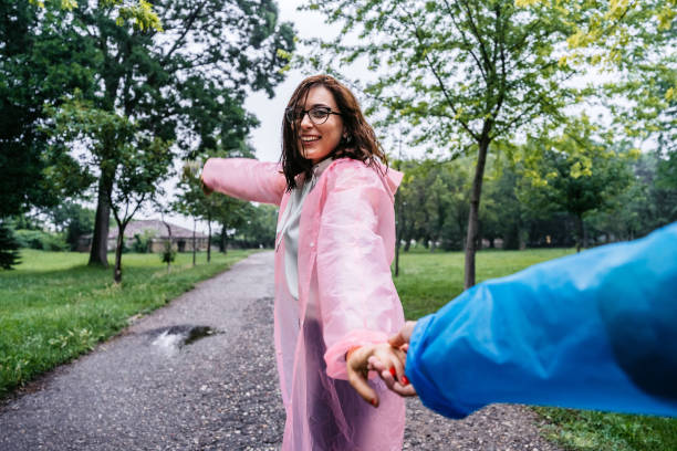 istock Couple having fun in the rainy day 1256271542