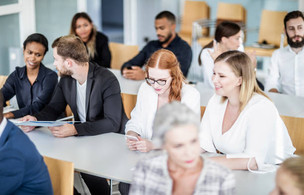 istock Business people at a conference 1256271583