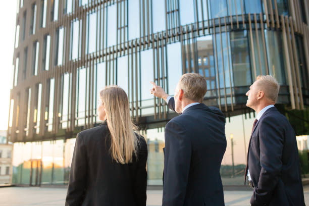 istock Group of business partners in formal suits 1256272177