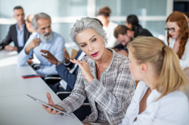 istock Business people at a conference 1256273639