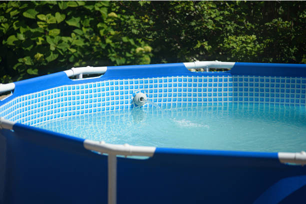 istock Home swimming pool with filtration system for clean water 1256274979