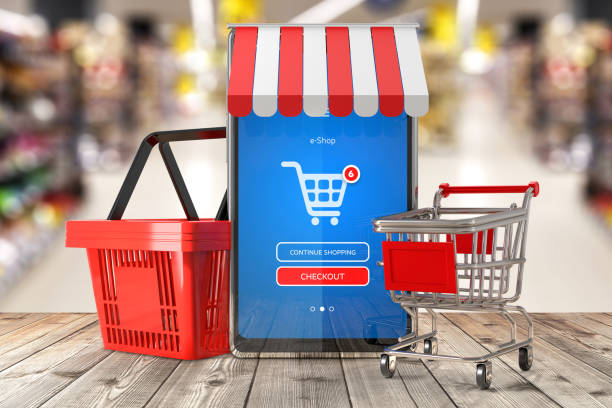 Smartphone with mobile e-shop application on screen. Shopping basket and shopping trolley cart on supermarket interior background. Symbol of online shopping and delivery - 3d illustration stock photo