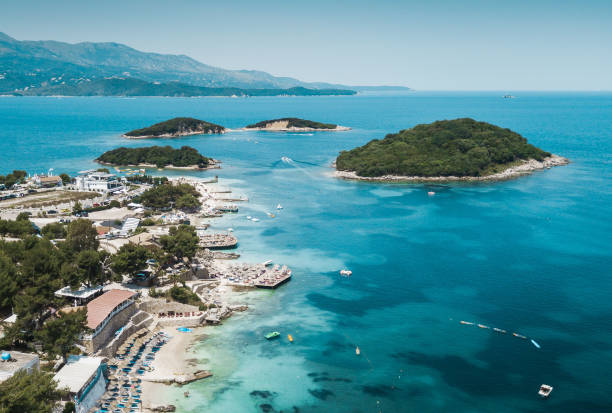 istock Drone shot flying over Ksamil beach, Albania. 1256277142