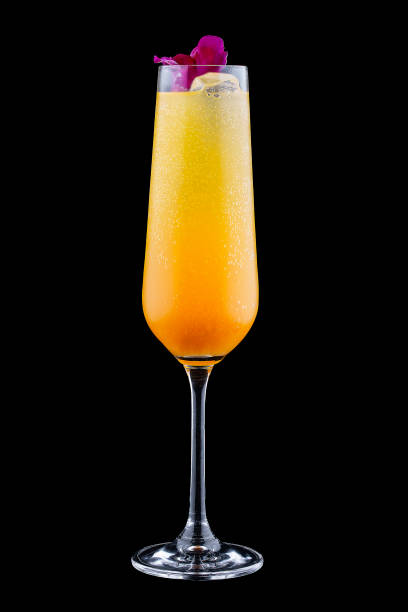 istock Exquisite cold cocktail with champagne and orange juice on a dark background 1256277299