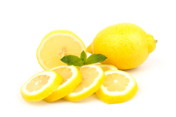 istock Group of lemons with mint leaves, isolated on white background 1256277455