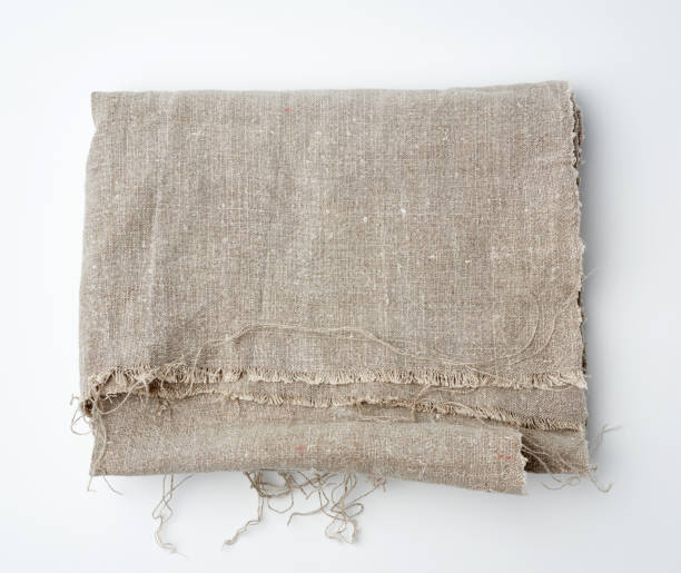 istock crumpled kitchen linen gray towel on white background, top view 1256280525