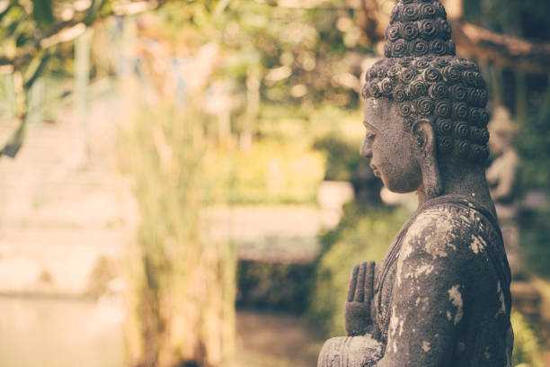 istock Stone Statue Of An Ancient Deity. Bali stone carving. 1256280815