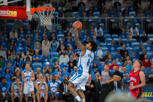 istock Basketball player aiming hoop 1256281686