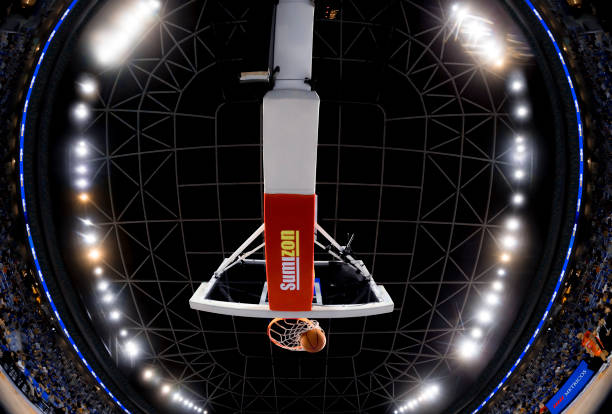 Basketball falling from basketball hoop