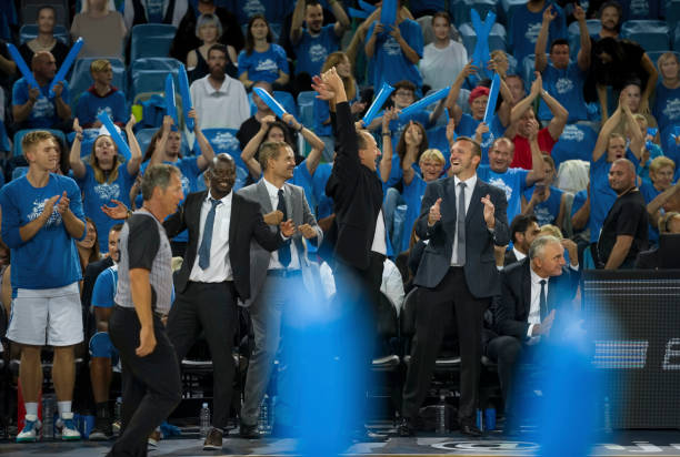 istock Coaches and spectators celebrating 1256281823