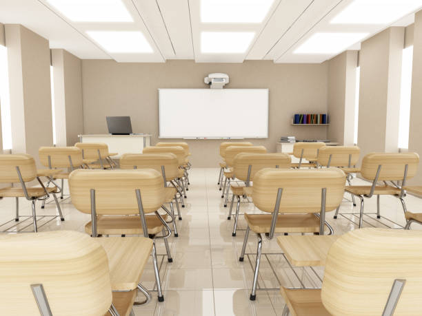 istock Wooden student chairs arranged in a row inside modern classroom 1256282075