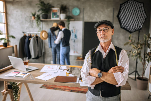 istock Senior professional tailor confidently posing for a photo 1256282351