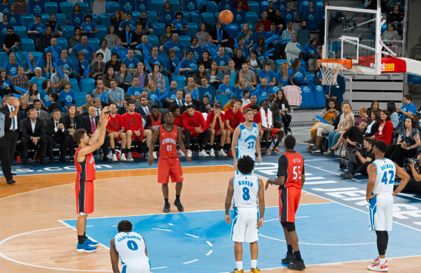 istock Basketball player taking penalty shot 1256283378