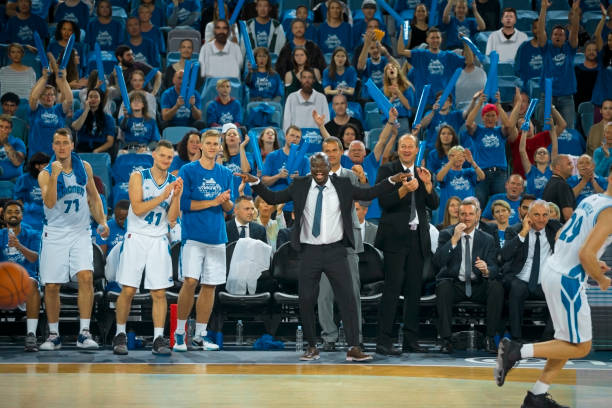 istock Coaches and teammates celebrating 1256283390