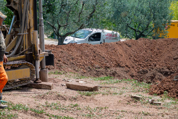 bien auger pendant un emploi - borehole construction environment boredom photos et images de collection