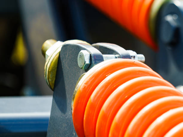 istock Industrial spring at agricultural machine 1256288894