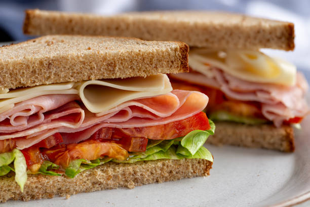 istock Ham and Cheese Sandwich on Whole Wheat Bread 1256292112
