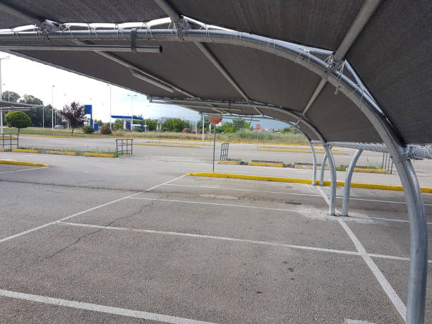 istock parking shed tent ca rgarage shadow sun protection 1256294427