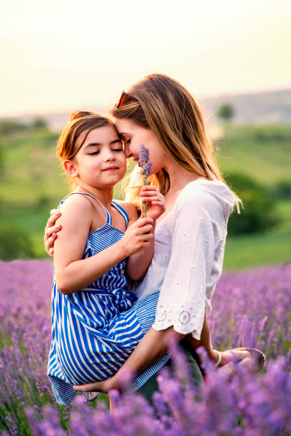istock Happy family in lavender field 1256297592