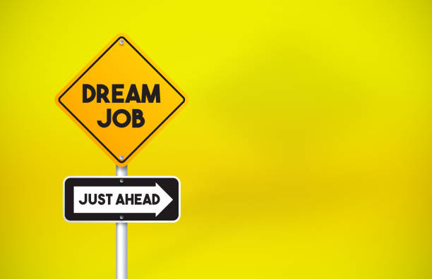 istock Dream Job Directional Road Sign On Yellow Background 1256297784
