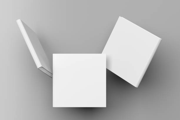 istock Square blank book cover mock up flying. Front, spine and back cover views. 1256297820