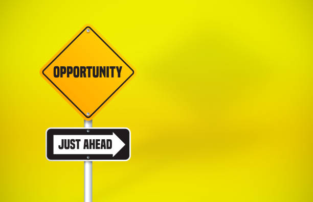 Opportunity Directional Road Sign On Yellow Background. Horizontal composition with copy space.