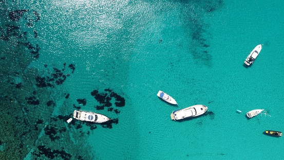 Boats in adriatic sea on sakarun beach on brac island in Croatia