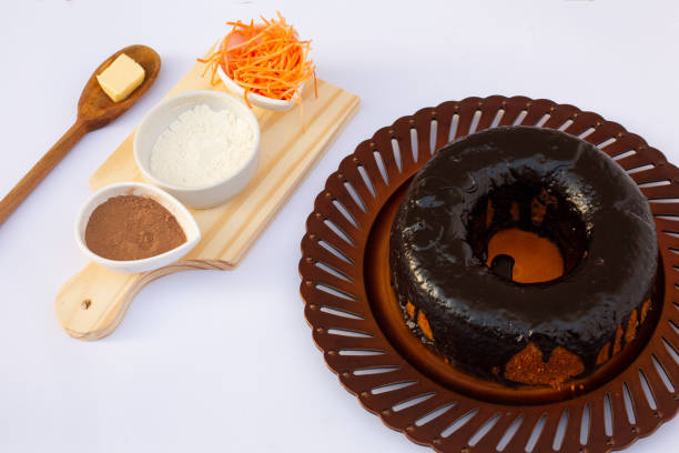 carrot cake with chocolate icing, healthy cake with 70% cocoa. stock photo