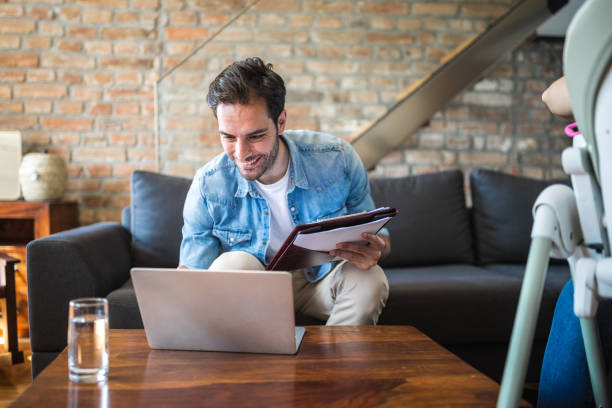 istock Young man working at home due to pandemic isolation 1256312078