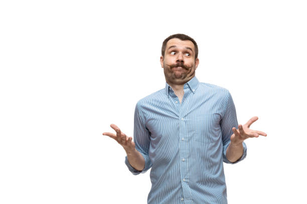 istock Young caucasian man with funny, unusual popular emotions and gestures isolated on white studio background 1256314552