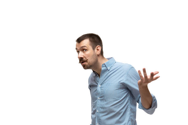 istock Young caucasian man with funny, unusual popular emotions and gestures isolated on white studio background 1256314593
