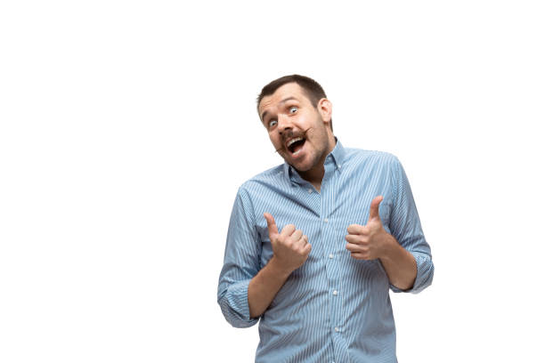 istock Young caucasian man with funny, unusual popular emotions and gestures isolated on white studio background 1256314594