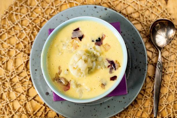 istock Mixed creamy cauliflower soup in bowl. 1256317199