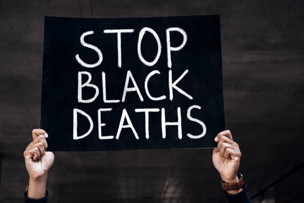 Stop racism Afroamerican man holds banner. Anti-racism concept. i cant breathe photos stock pictures, royalty-free photos & images