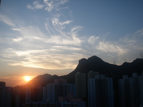 Lion Rock with Hong Kong public housing under sunset and beautiful sky