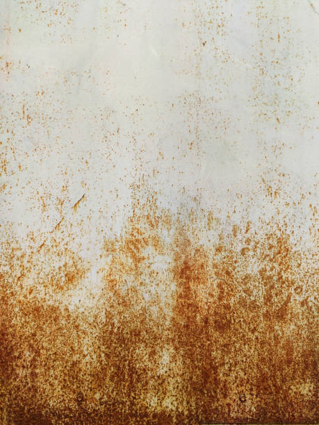 istock Corroded metal background. Rusty metal background with streaks of rust. Rust stains. Rystycorrosion. 1256322343