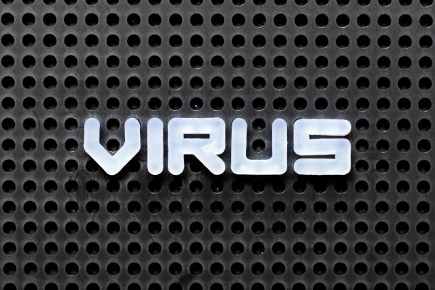 istock White color alphabet with word virus on black pegboard background 1256325874