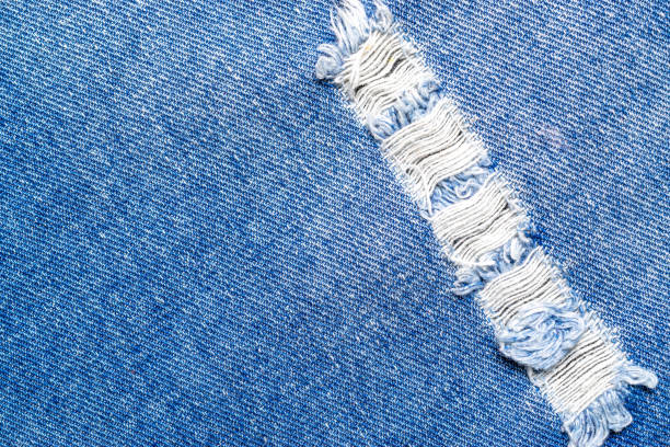 istock Jeans texture. Blue denim textile pattern in close up. Indigo cloth material fashion with copy space for vintage background or wallpaper 1256325916