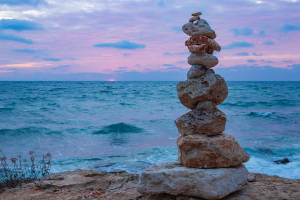 istock The object of the stones on the beach at sunset. 1256327747