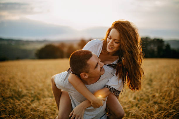 istock A couple enjoying the sunset in nature 1256330037