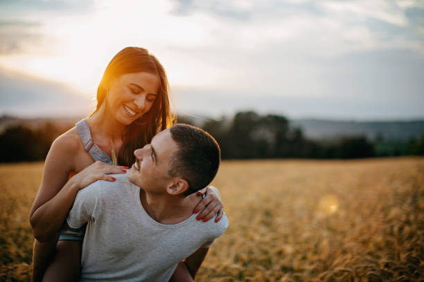 istock A couple enjoying the sunset in nature 1256333192