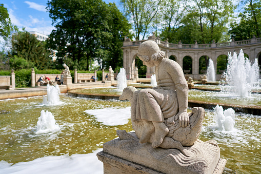 Figure at the Marchenbrunnen fairytale fountain from 1913 in the public Volkspark Friedrichshain in Berlin