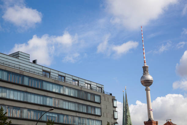 istock A modern building and a TV Tower 1256335567