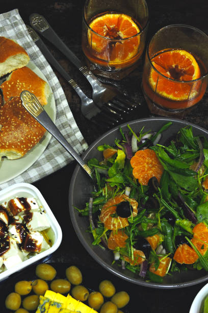 istock Green salad with mandarin orange. 1256336376