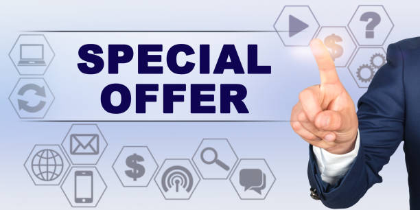istock Businessman touching virtual screen with his finger. Screen caption - SPECIAL OFFER 1256337566