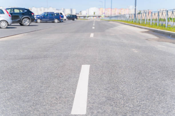 istock Sity  road  and road markings, focus to the foreground, blurred background 1256337863