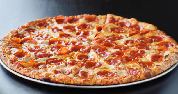 istock large american style pepperoni and cheese pizza 1256339152