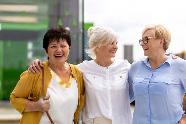istock Three senior female friends having good time together 1256339189
