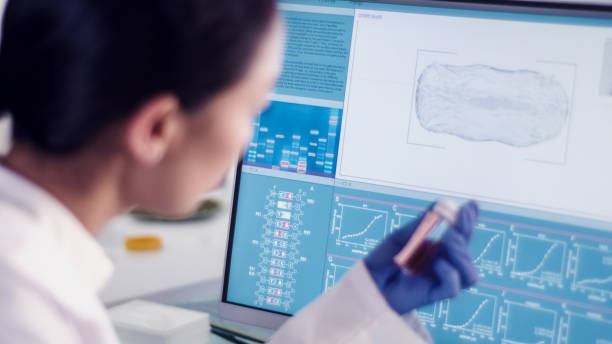 istock Female scientist in Laboratory Research. Water flea daphnia on Computer Screen 1256339321