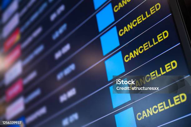 Airport Lockdown Flights Cancellation On Time Table Stock Photo - Download Image Now